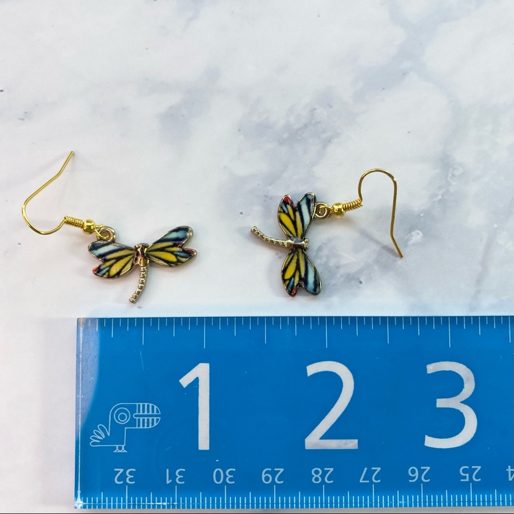 Gold dragonfly charm earrings. - Picture 3 of 3